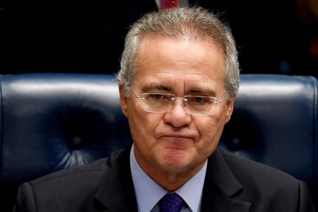 Brazilian Senate President Renan Calheiros speaks during a session of the Senate in Brasilia on December 8, 2016.  Brazil's Supreme Court Wednesday overruled a bid to suspend the powerful Senate speaker from his position as he faces trial for alleged embezzlement, offering some relief to the scandal-hit government. / AFP PHOTO / EVARISTO SA